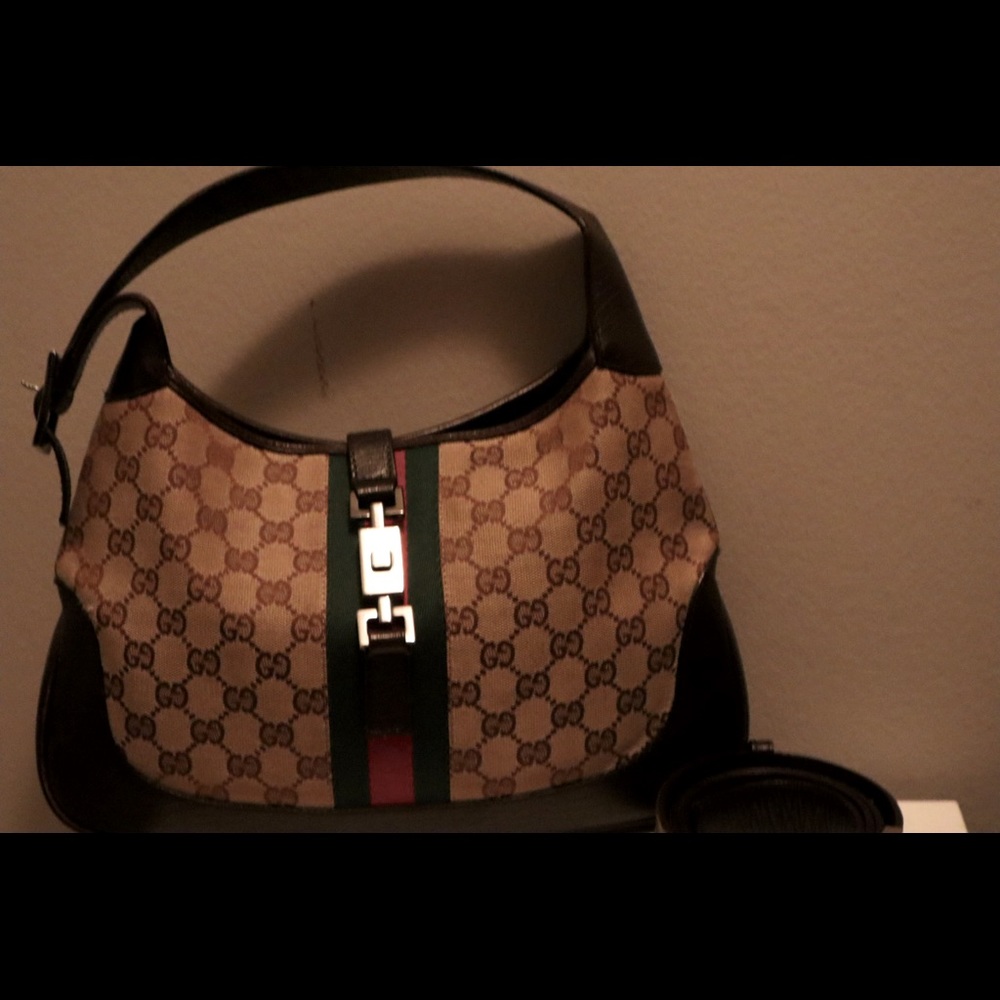 Hi, This is the vintage Gucci Jackie O Monogram Hobo.